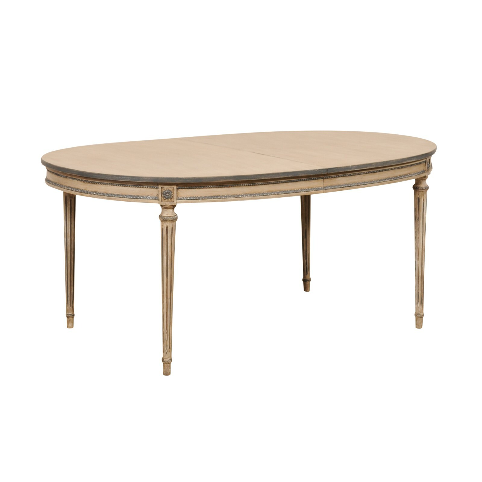 Oval-Shaped Dining Table on Fluted Legs